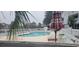 Inviting outdoor pool area with lounge chairs and shade, perfect for relaxation and recreation at 3700 Golf Colony Dr. # 26G, Little River, SC 29566