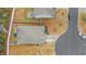 Aerial view of a home with a well-maintained lawn and landscaping at 414 Antietam Place, Little River, SC 29566