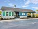 Exterior view of a community clubhouse with a charming coastal design at 414 Antietam Place, Little River, SC 29566