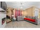 Comfortable living room with hardwood floors and a modern fireplace feature at 414 Antietam Place, Little River, SC 29566