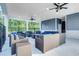 Covered patio with comfortable seating, perfect for outdoor relaxation at 414 Antietam Place, Little River, SC 29566
