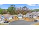 Street view of three charming homes with well-kept yards and curb appeal at 414 Antietam Place, Little River, SC 29566