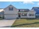 Charming single-Gathering home with a well-manicured lawn and an attached two-car garage at 621 Woodside Dr., Conway, SC 29526