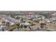 Wide aerial view of the community layout including townhomes, ponds, a pool, and surrounding greenery at 650 Wilshire Ln., Murrells Inlet, SC 29576