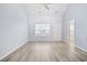 Bright living room with soaring ceilings, modern flooring, and abundant natural light at 650 Wilshire Ln., Murrells Inlet, SC 29576
