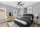 Comfortable bedroom featuring neutral colors, a ceiling fan, and natural light at 6606 Wildwood Trail # E, Myrtle Beach, SC 29572