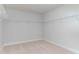 Spacious walk-in closet featuring neutral carpeting, bright white walls, and wire shelving for optimal storage solutions at 7006 Shooting Star Way, Myrtle Beach, SC 29579