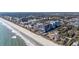 Coastal condo building with beach access and ocean views, near sandy shores and blue waters at 7509 N Ocean Blvd. # 1203, Myrtle Beach, SC 29572