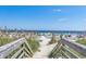 Scenic boardwalk leading to a sandy beach, perfect for leisurely strolls and enjoying the coastal scenery at 7509 N Ocean Blvd. # 1203, Myrtle Beach, SC 29572