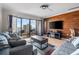Comfortable living room with balcony access offering scenic views at 7509 N Ocean Blvd. # 1203, Myrtle Beach, SC 29572