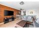 Spacious living room featuring modern furniture and a decorative wood wall at 7509 N Ocean Blvd. # 1203, Myrtle Beach, SC 29572