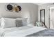 Comfortable bedroom with bright light, cool colors, and wood flooring offers a cozy and stylish retreat at 7509 N Ocean Blvd. # 1203, Myrtle Beach, SC 29572