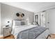 Comfortable bedroom with bright light, cool colors, and wood flooring offers a cozy and stylish retreat at 7509 N Ocean Blvd. # 1203, Myrtle Beach, SC 29572