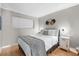 Comfortable bedroom with bright light, cool colors, and wood flooring offers a cozy and stylish retreat at 7509 N Ocean Blvd. # 1203, Myrtle Beach, SC 29572