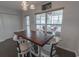 Bright breakfast nook featuring a wooden table, stylish chairs, and sliding glass doors to the patio at 901 Tullamore Ct., Myrtle Beach, SC 29579