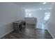 Upstairs hallway office area with wood desk, chair, and good lighting at 901 Tullamore Ct., Myrtle Beach, SC 29579