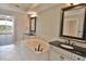 Bathroom with double vanities, jacuzzi tub, and large mirror offering a spa-like retreat at 9547 Edgerton Dr. # 204, Myrtle Beach, SC 29572