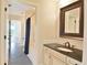 The bathroom features a granite countertop vanity and shower/tub combination at 9547 Edgerton Dr. # 204, Myrtle Beach, SC 29572