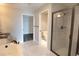 Bathroom features a shower, separate toilet room, and double vanity sink at 9547 Edgerton Dr. # 204, Myrtle Beach, SC 29572