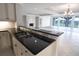 Gourmet kitchen with granite counters and open layout to the living area at 9547 Edgerton Dr. # 204, Myrtle Beach, SC 29572