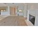 Open floor plan with a fireplace, wet bar, and view into the kitchen at 9547 Edgerton Dr. # 204, Myrtle Beach, SC 29572