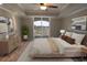 Comfortable bedroom with balcony access, a dresser, and a king bed at 9547 Edgerton Dr. # 204, Myrtle Beach, SC 29572