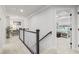 Bright hallway features a desk, decor, and carpeted floors leading to the main bedroom at 101 Galil Dr. # A, Myrtle Beach, SC 29579