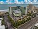 Aerial view of a large hotel with parking, streets, and an ocean backdrop at 1105 South Ocean Blvd. # 852, Myrtle Beach, SC 29577