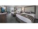 Bright bedroom featuring two queen beds, a TV, and balcony access with ocean view at 1105 South Ocean Blvd. # 852, Myrtle Beach, SC 29577