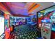 Fun game room with various arcade games and vibrant lighting for entertainment at 1105 South Ocean Blvd. # 852, Myrtle Beach, SC 29577