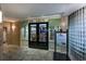 Welcoming entrance to Sea Level Restaurant with black doors and large windows at 1105 South Ocean Blvd. # 852, Myrtle Beach, SC 29577