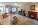 Cozy living room featuring a fireplace, neutral walls, and comfortable seating at 1182 Palm Crossing Dr., Little River, SC 29566