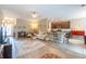 Cozy living area open to the kitchen, with a comfortable seating area and bar stools at 1182 Palm Crossing Dr., Little River, SC 29566