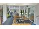 Community gym features modern equipment, mirrored walls, and ample natural light at 1221 Tidewater Dr. # 2821, North Myrtle Beach, SC 29582