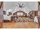 Spacious bedroom featuring two beds, hardwood floors, fireplace, and unique ceiling fans at 161 Twelve Oaks Dr., Pawleys Island, SC 29585