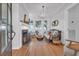 Elegant living room with fireplace, hardwood floors, and beautiful natural light at 161 Twelve Oaks Dr., Pawleys Island, SC 29585