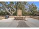 Outdoor dining area with brick fireplace and built-in seating at 161 Twelve Oaks Dr., Pawleys Island, SC 29585