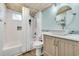 Modern bathroom with a stylish vanity, vessel sink, and tiled shower at 163 Heron Marsh Dr. # 61, Pawleys Island, SC 29585