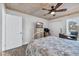 Bedroom featuring neutral decor, hardwood floors, and a ceiling fan at 163 Heron Marsh Dr. # 61, Pawleys Island, SC 29585