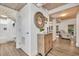 Hallway decorated with beach house accents, wooden floors, and shiplap ceiling at 163 Heron Marsh Dr. # 61, Pawleys Island, SC 29585