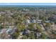 Aerial view of the neighborhood showing the close proximity of homes, trees and the ocean in the distance at 170 Minnow Dr., Pawleys Island, SC 29585