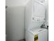 Laundry room with stacked washer and dryer at 170 Minnow Dr., Pawleys Island, SC 29585