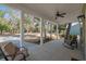 Inviting front porch with rocking chairs and a ceiling fan for relaxing outdoors at 170 Minnow Dr., Pawleys Island, SC 29585