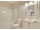 Cozy bathroom with a tub/shower combo, toilet, and single sink vanity at 1741 Rice St., Georgetown, SC 29440