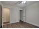 Bedroom with wood-look floors and access to closet and bathroom at 1741 Rice St., Georgetown, SC 29440