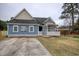 Quaint home with a welcoming front porch and well-manicured lawn at 1741 Rice St., Georgetown, SC 29440