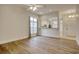 Bright living room features wood floors and a view to the kitchen at 1741 Rice St., Georgetown, SC 29440