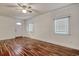 Living space features wood-look floors, shiplap walls, and windows for natural light at 1741 Rice St., Georgetown, SC 29440