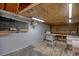 Well-lit shed interior featuring a workbench, storage and pegboard at 1741 Rice St., Georgetown, SC 29440