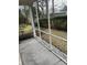 Enclosed porch showing a concrete floor and view of the backyard at 1742 Low Country Pl. # A, Myrtle Beach, SC 29577